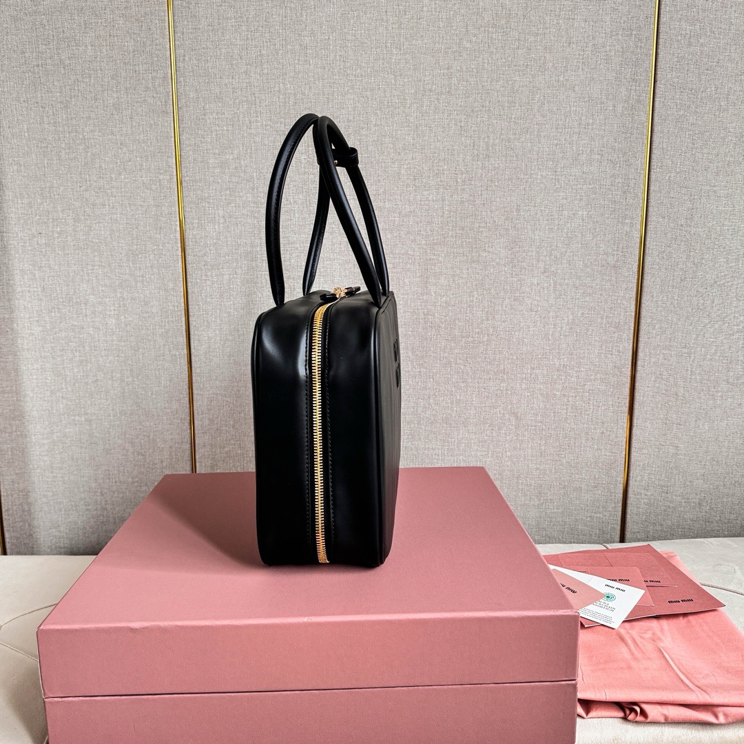 M*um*u leather top handbag-34x23x12cm