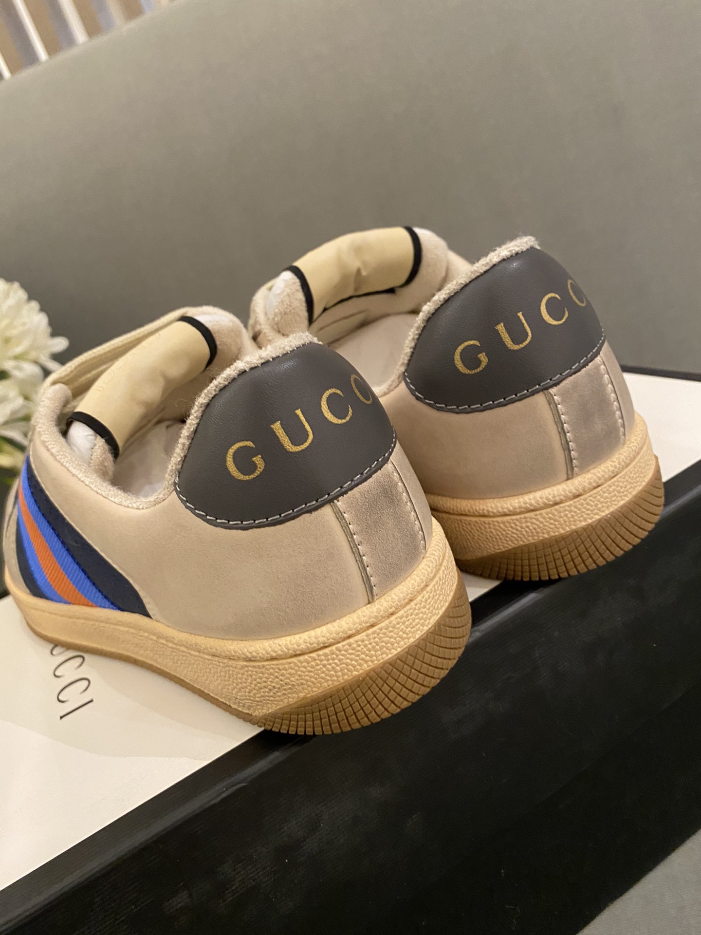 G*u*i sneakers