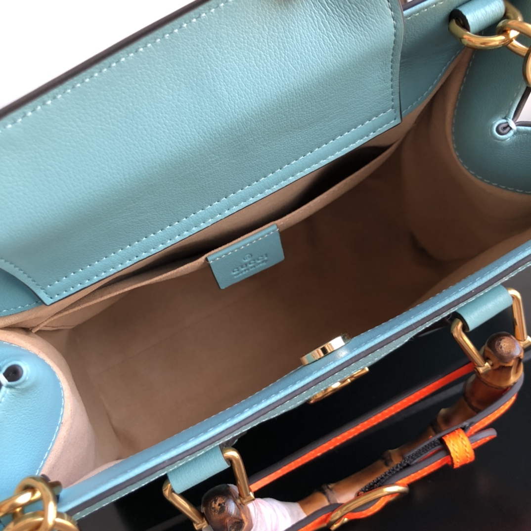 G*u*i diana top handbags